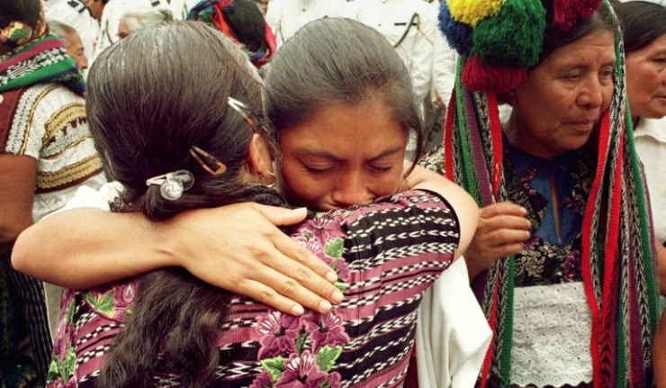 Mayan Indians mourn outside the Metropolitan Cathedral during the funeral of Bishop Juan Gerardi in Guatemala City, 29 April, 1998.